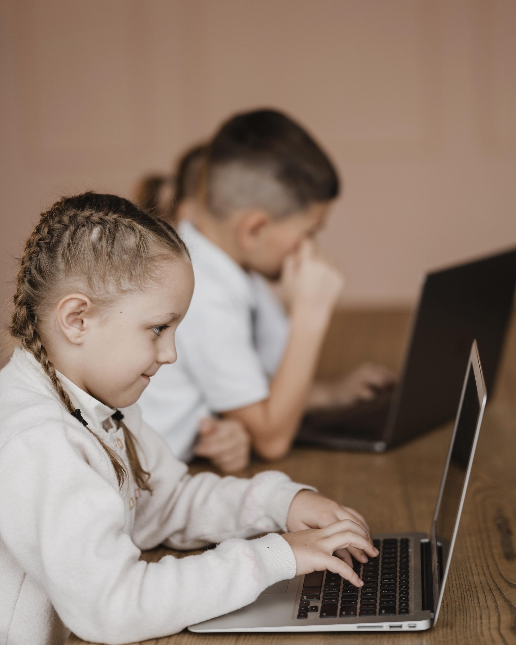 kids-using-laptops-indoors